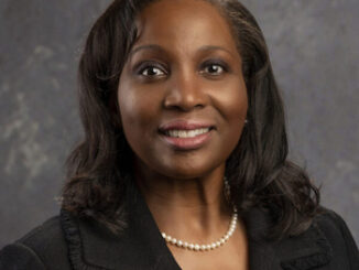 American economist and a historic figure Dr. Lisa DeNell Cook